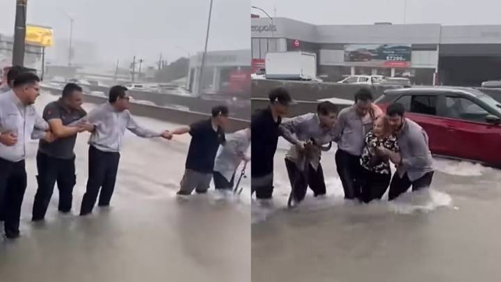 Conductora queda atrapada en avenida Gonzalitos tras lluvias en Monterrey; hombres la rescatan