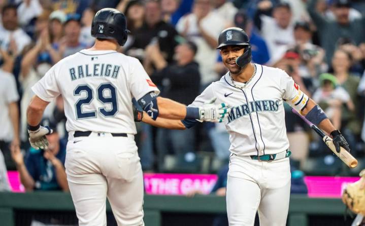 Behind Cal Raleigh's 60th homer, Mariners clinch first AL West crown since 2001