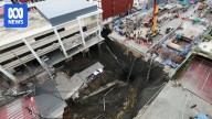 Dramatic footage shows sinkhole swallowing up road in central Bangkok