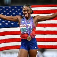 Jefferson-Wooden surges to women's 100 metres world title