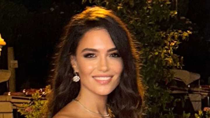 Glamorous Champions League host Eva Murati shows off stunning figure in tiny red dress before returning to day job
