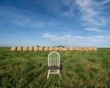 A chair in the middle of a field? It makes more sense than it should.