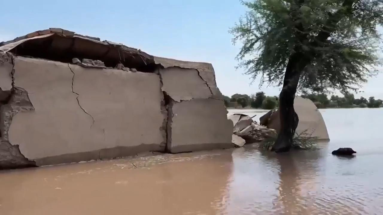 Emergency workers use drones to find people stranded on rooftops by massive floods in Pakistan