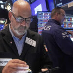 Federal Reserve cuts key interest rate, signals 2 more reductions this year
