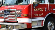 Pregnant woman unhurt after being rescued from Akron house fire