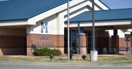 Officials respond to school bus rollover crash involving Oklahoma HS softball team