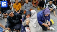 Rescuers search for missing students a day after Indonesian boarding school collapses during prayers