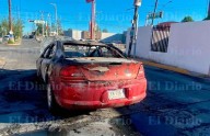 Abandonan auto calcinado a media avenida De la Industrias