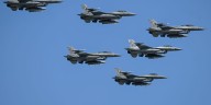 Poland scrambles jets, shuts key airport amid drone threat