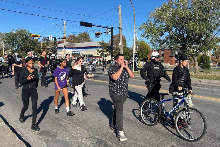 Protesters demand body cameras after fatal shooting of 15