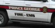 Overturned logging truck shuts down Prince George roadway
