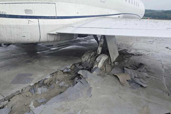 Plane stopped by safety zone at end of runway at Virginia airport