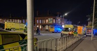 Person rushed to hospital after falling nearly 100 feet down embankment in Liverpool