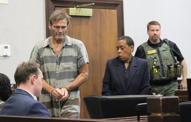 Judge revokes bond for alleged dog slayer