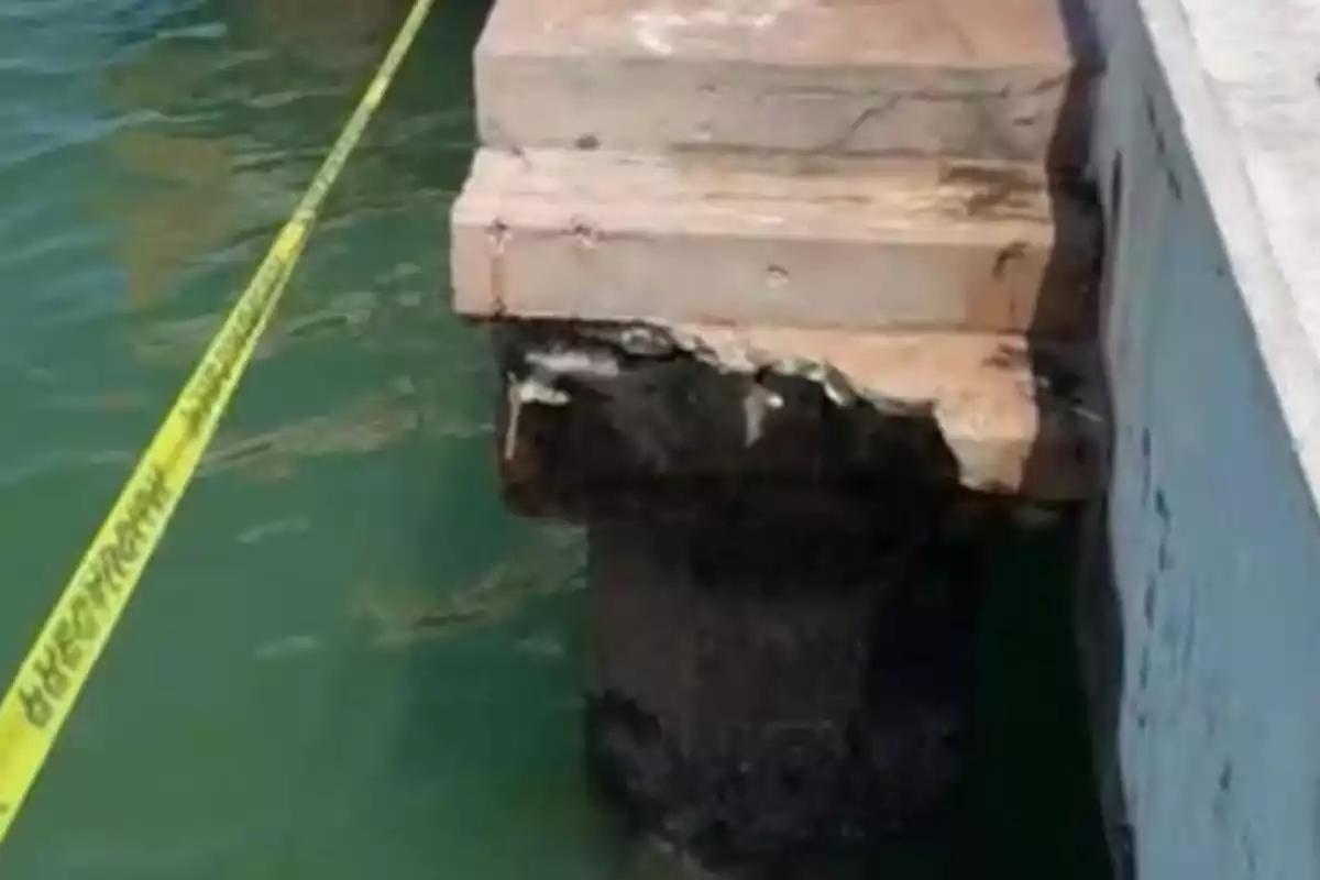Colapsa estructura del muelle de Chicxulub y deja dos lesionados