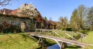'Our home's been lived in for over 1,000 years - it sucks you in but costs £7,000 a month to run'