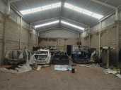 Aseguran bodega utilizada para desvalijar automóviles en Toluca