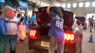 Miami Marlins team up with Florida Blue for a drive-thru food distribution at ball park