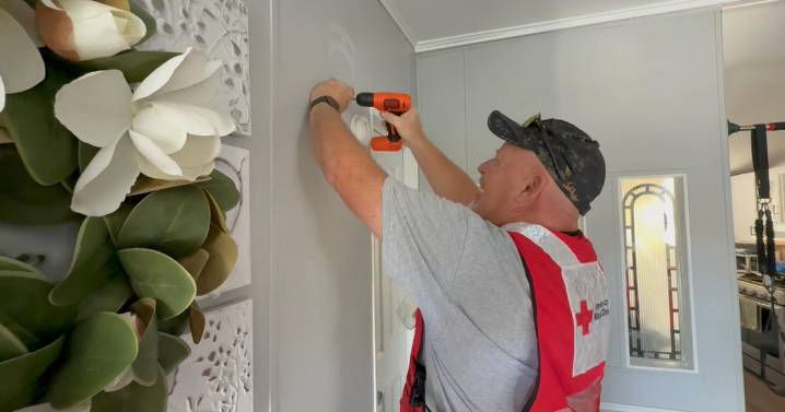 Volunteers install free smoke alarms in a Colorado mobile home community