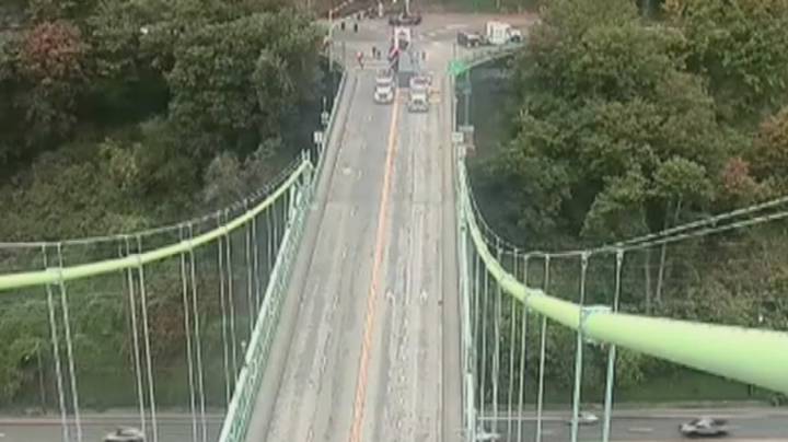 St. Johns Bridge completely closed after truck spills load