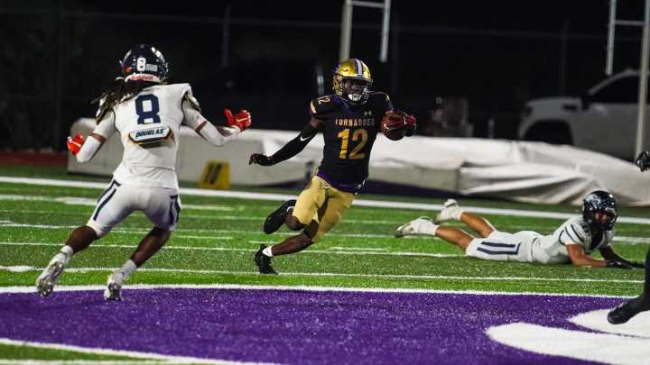 PHOTOS: Naples at Booker football game