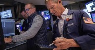 Wall Street ticks higher before the bell as markets anxiously await the Fed's interest rate decision