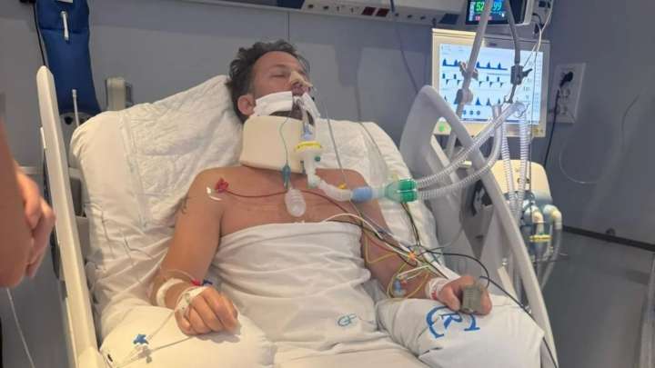 Brit dad-of-two, 37, left paralysed after breaking his spine while diving into the sea during Ibiza family holiday
