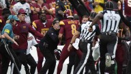 Commanders coach Dan Quinn bloodied in sideline collision with Marcus Mariota