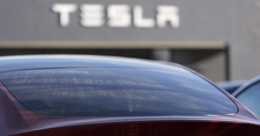 Tesla under investigation after parents say faulty door handles trapped kids