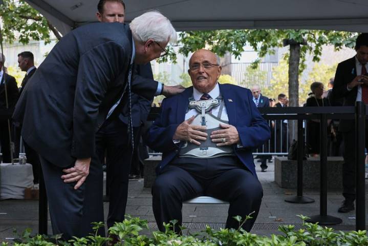 Photos: Rudy Giuliani appears at 9/11 ceremony in brace after being 'seriously injured' in crash