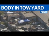 Body found in burned car at South LA tow yard
