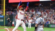 Phillies hit team-record 8 homers to clinch first
