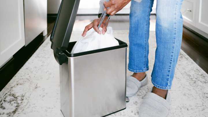 TikTok's Genius Tip Makes Cleaning The Bottom Of Your Garbage Can A Breeze