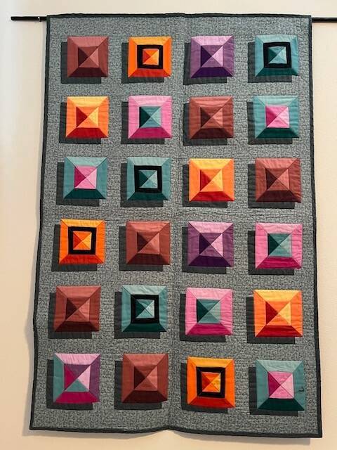 Quilters on the Rock works on display
