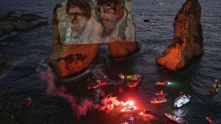 Hezbollah defies ban, projects images on Beirut’s iconic rocks