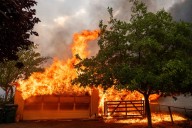 Quick-moving wildfire scorches historic California gold mining town, burning multiple homes
