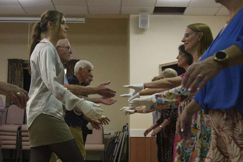 Jane Austen fans honor 250 years since her birth with grand costumed balls and dancing