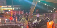 Man rescued after car gets stuck in fenced
