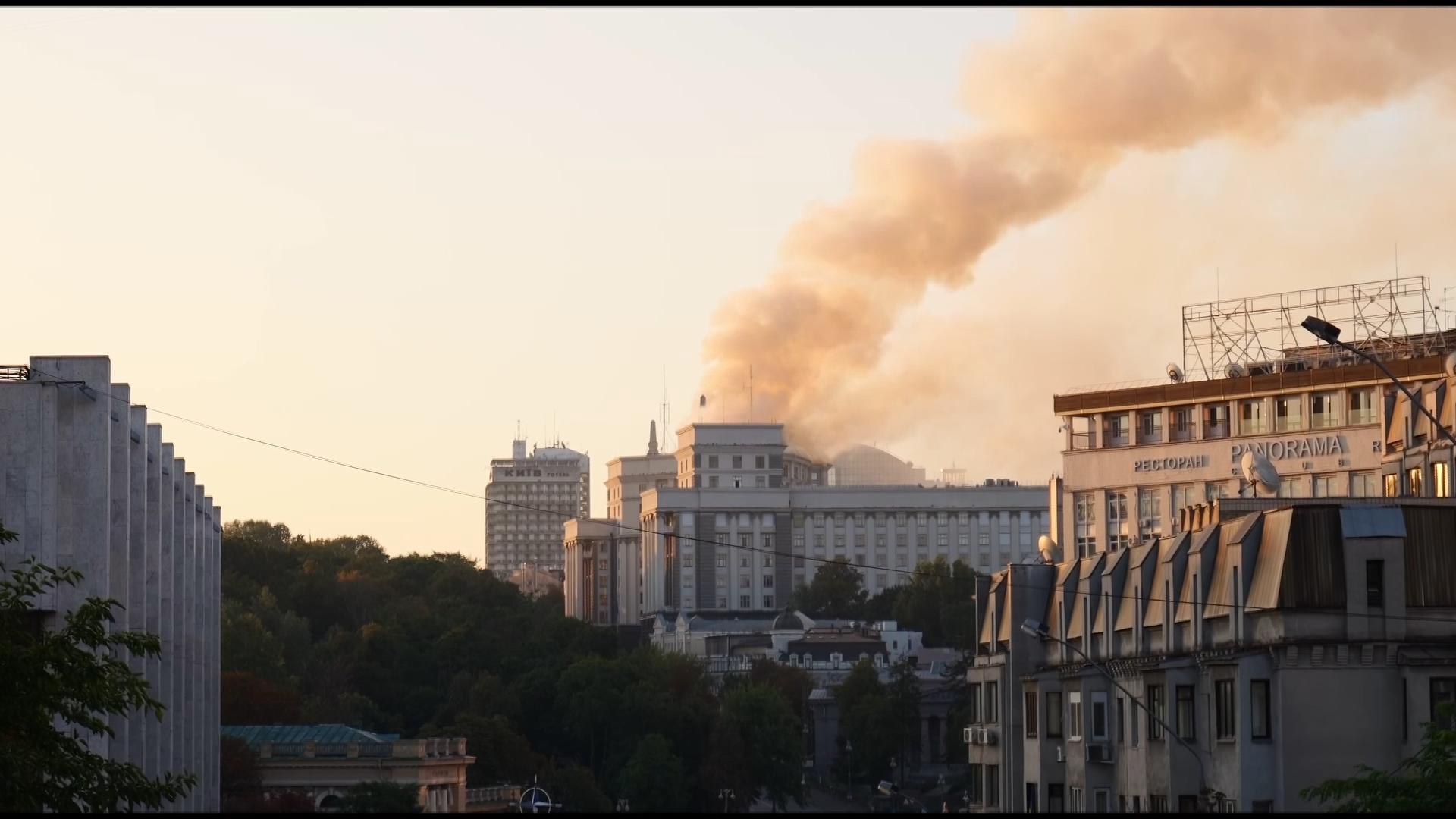 Smoke rises from roof of a key government building after mass Russian attack on Kyiv
