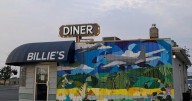 Local artist brings diner wall to life with vibrant aviation mural