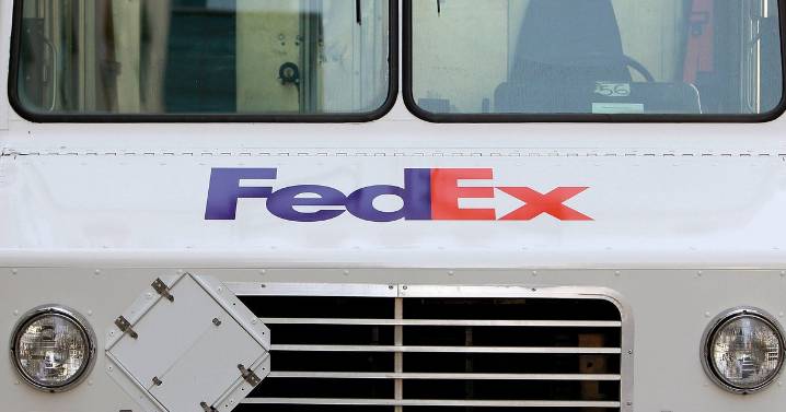 Dallas FedEx worker charged after hammer and gun attack on co