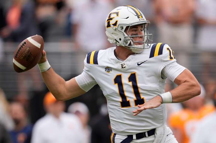 Ex-Michigan QB cracks 5,000 career passing yards but throws 2 picks in loss