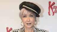 Cyndi Lauper, 72, rocks spiky blue hair and funky polka-dot suit at NYFW event with Martha Stewart