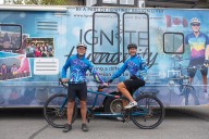 Tandem cyclists reach Yukon on 9,100-kilometre ride to fund classrooms