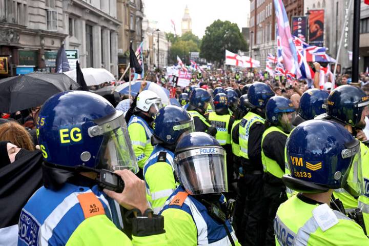 Far-right rally in London draws huge crowd and a counterprotest