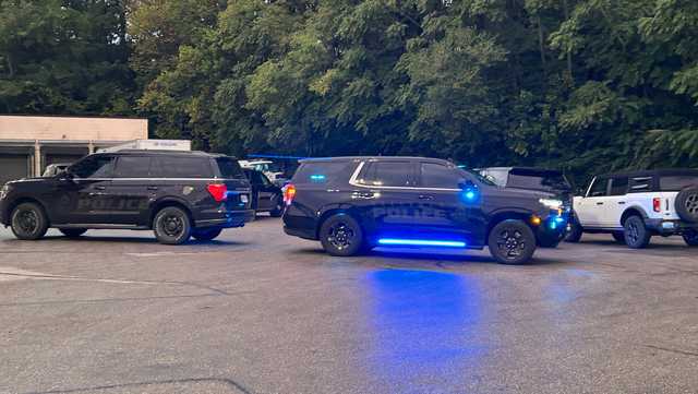 Police investigating after body found in wooded area behind Bellevue Kroger