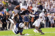 No. 6 Oregon edges No. 3 Penn State 30-24 in double overtime classic