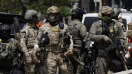 California bans most law enforcement officers from wearing masks