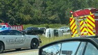 Vehicle overturned on I-75 south in Peach County, blocking left lane and causing delays