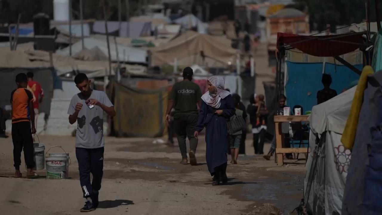 People in Deir al-Balah react as some countries recognize Palestinian state